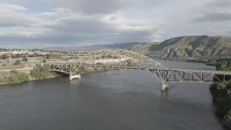 car traffic on bridge over columbia river in wenatchee, usa