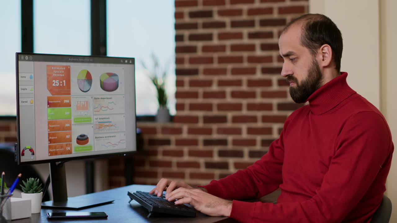 Financial analyst creating e commerce data graphs on screen