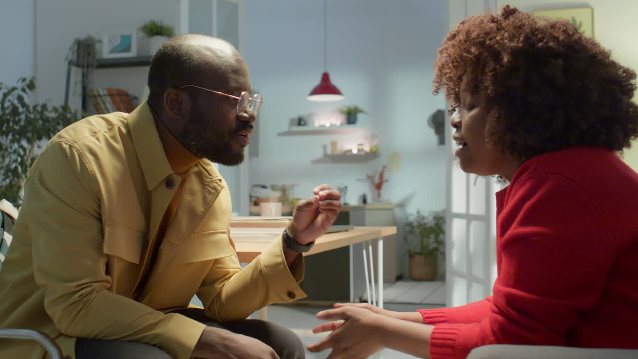 Emotional Husband Quarreling with Frustrated Wife