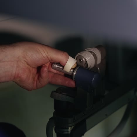 surgeon performs an operation on a patient through the da vinci machine. doctor manages the arms of the robotic tools. new technologies in medicine
