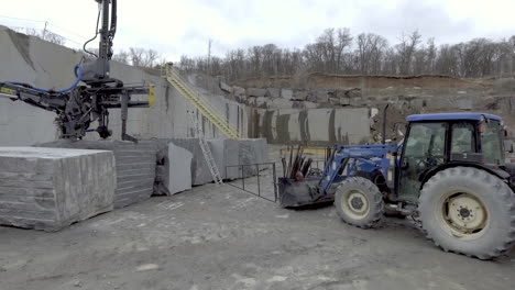 slow camera move of granite mining stone quarry