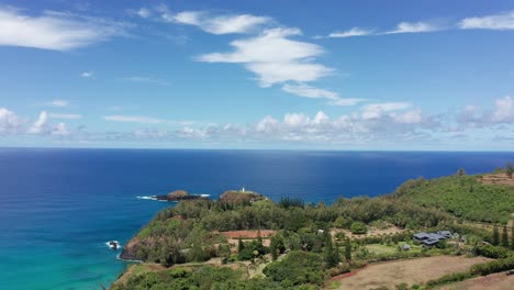 aerial wide rising shot of kilauea point and kilauea lighthouse on the island of kaua'i, the most northern place in the hawaiian islands