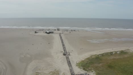 drone - aerial shot of the sandy beach of st. peter ording at the north sea, schleswig holstein, germany, 30p