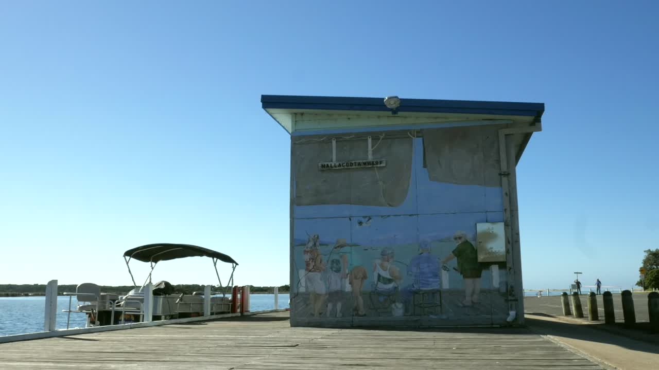 Wallacott Wharf: A Peaceful Fishing Scene