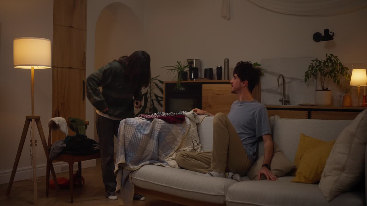 Couple Arguing Over Laundry at Home