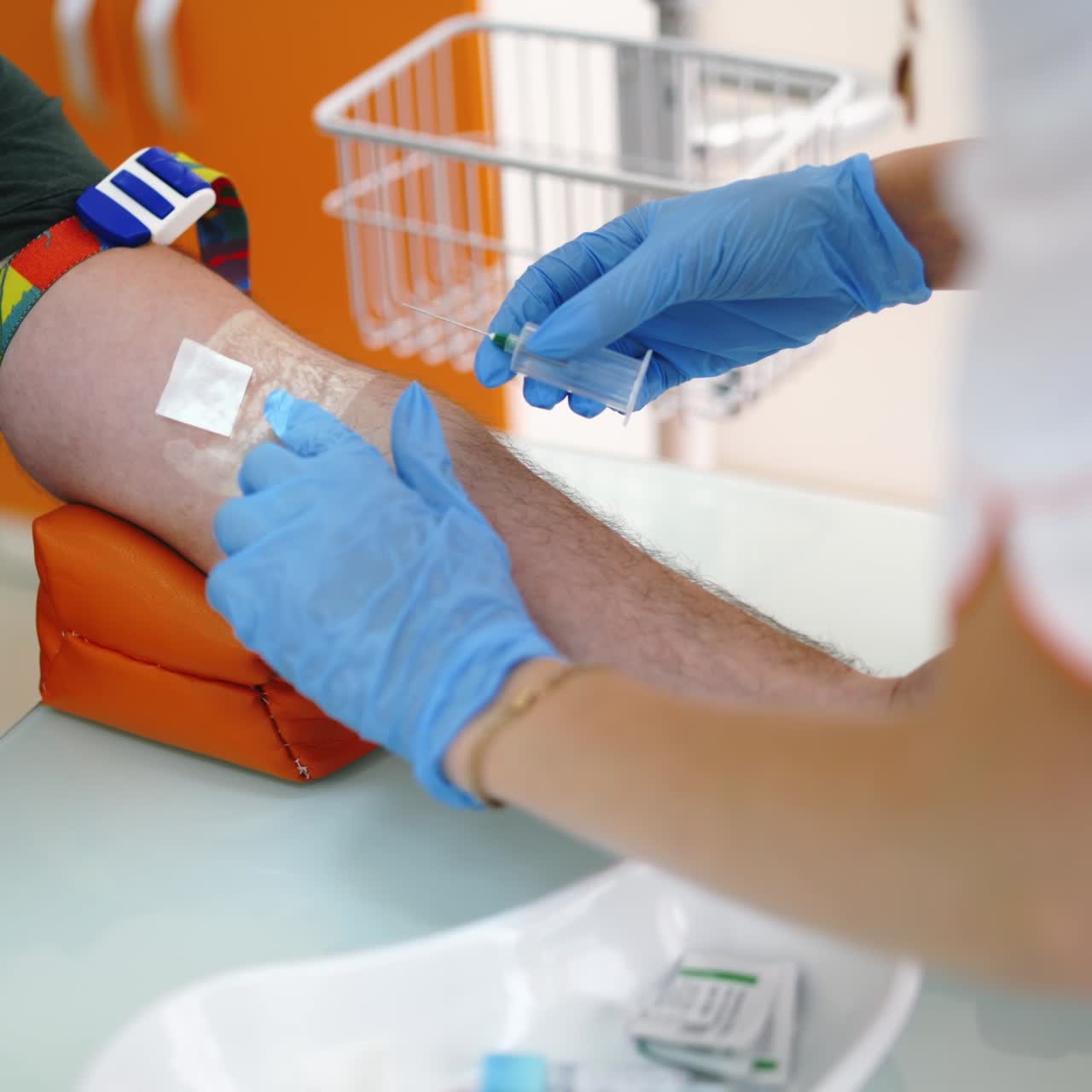 Close up process of taking blood