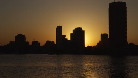 a view of a building overlooking on nile, close up shot, trucking shot