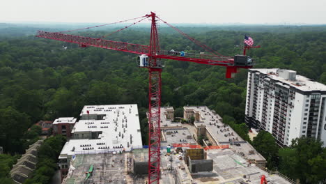 aerial view of construction of new multistorey building in city outskirts