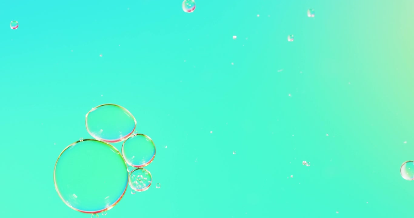 Animation of bubbles moving on blue background with copy space