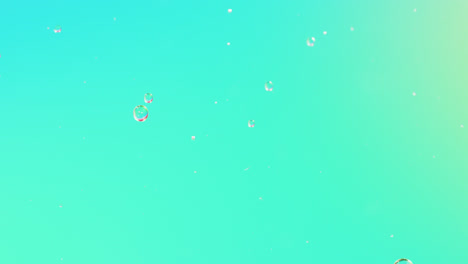 Animation-of-bubbles-moving-on-blue-background-with-copy-space