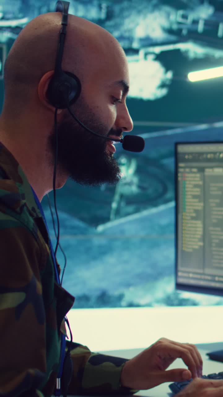 Military Operator Communicating and Working in Control Room