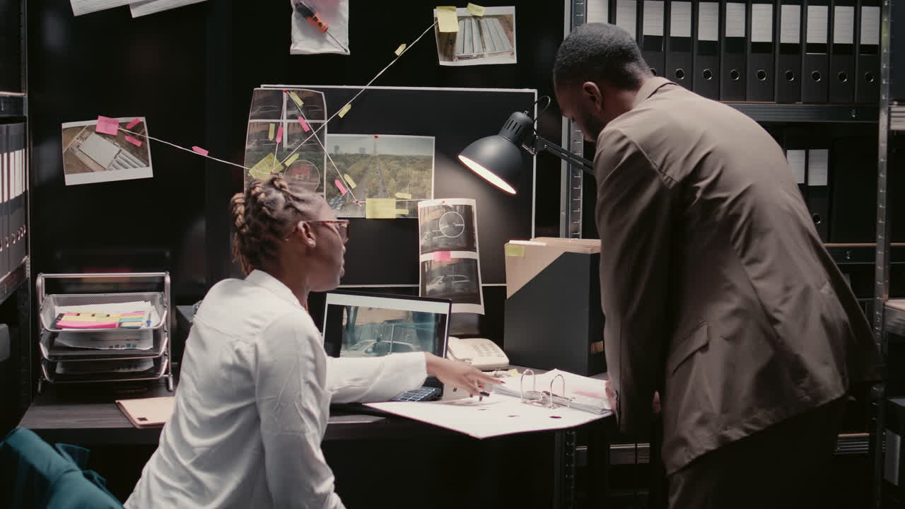 Detectives Investigating Crime Scene