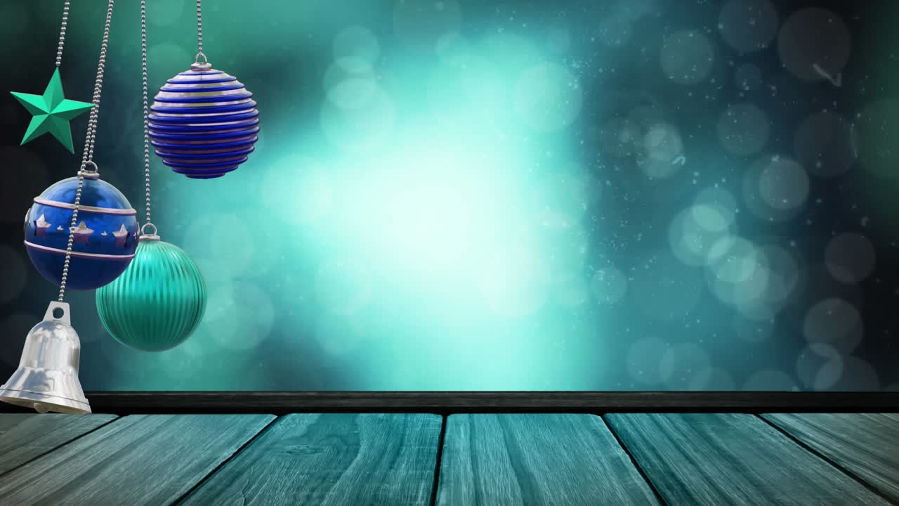 Animation of christmas baubles and snow falling on blue background ...