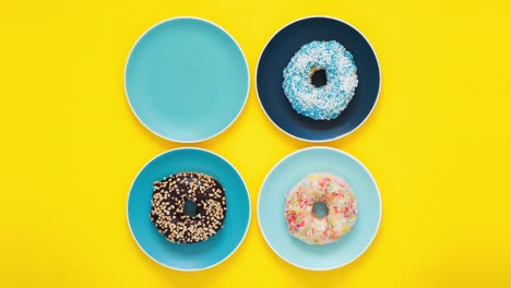 colección de rosquillas coloridas en movimiento animaciones. vista superior