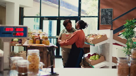 supplier bringing fresh products to vendor at farmers market