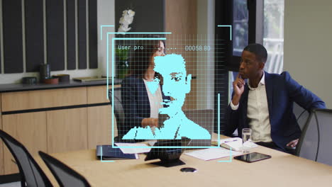 animation of digital profile picture over diverse coworkers discussing reports on laptop in office