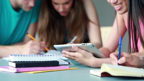 Classmates-studying-and-using-tablet-pc