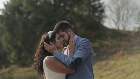 Groom-with-bride-in-the-park.-Wedding-couple.-Happy-family-in-love