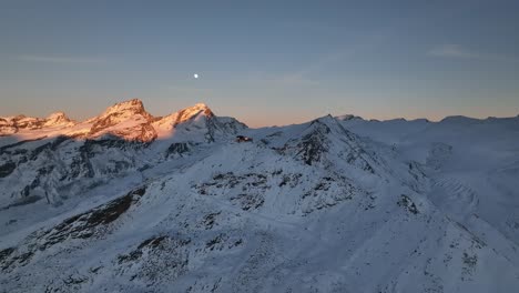 rotating epic aerial time lapse around mountain summit station