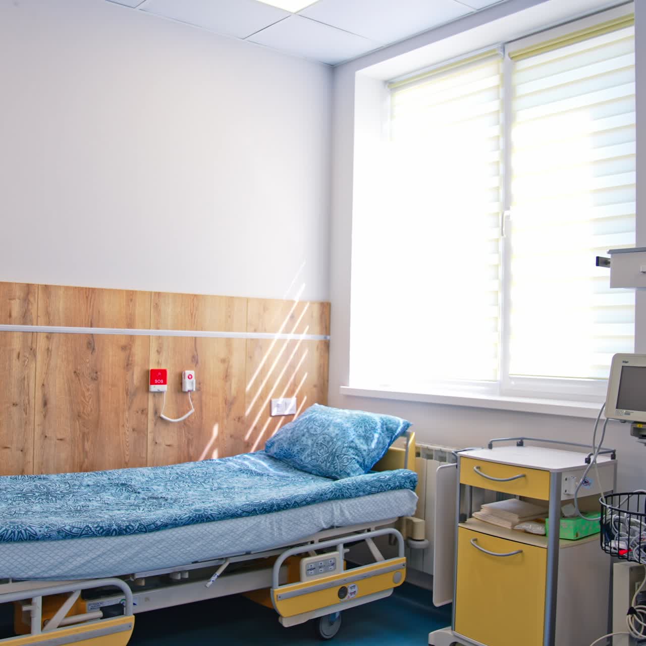 Modern bed for patients after difficult labors. New comfortable postpartum intensive care unit in hospital