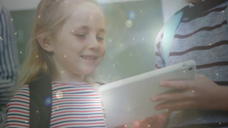 molecule structures moving against boy and girl using digital tablet