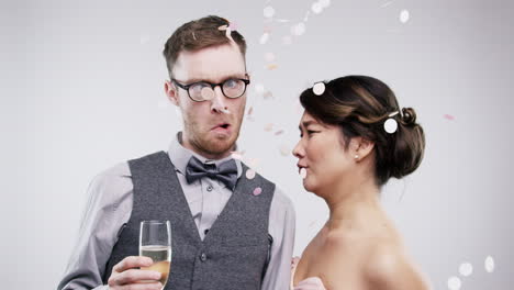 couple celebrating with confetti