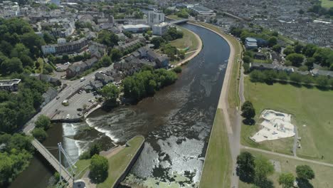 aerial following the river exe convergence into the city centre