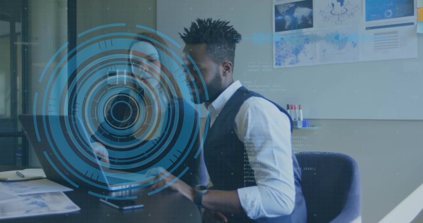 Business Professionals Collaborating on Data Analysis in Modern Office