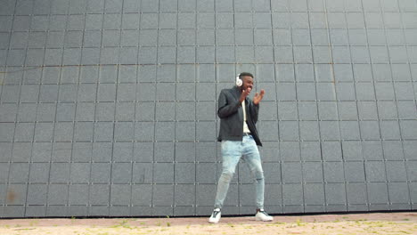 man dancing with headphones