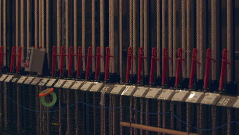 ropes and pulls side stage of a theater with camera drift