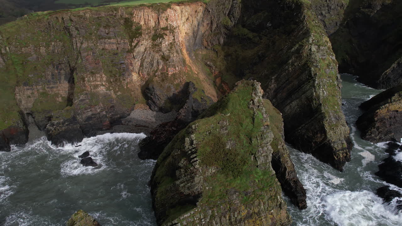 Aerial View, Nohoval Cove, Rocks and Steep Eroded Cliffs on Coastline of Ireland