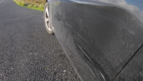 minor scratches on a accident car on highway tilt up