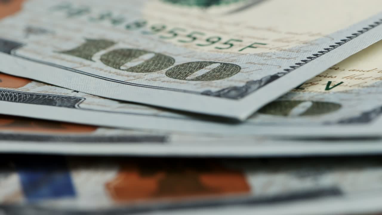 Close up currency US dollar banknotes. Income and Business concept.