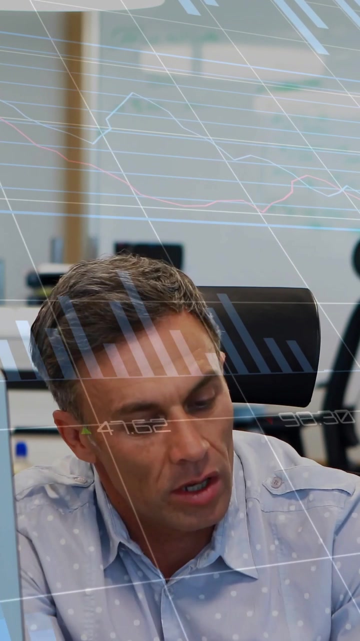 Vertical video: Mature man following colleague pointing tablet for business review, charts sweeping