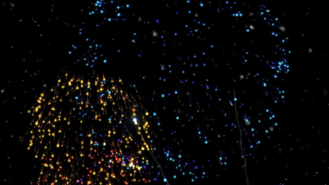 animación de partículas blancas sobre fuegos artificiales de colores que explotan contra un fondo negro