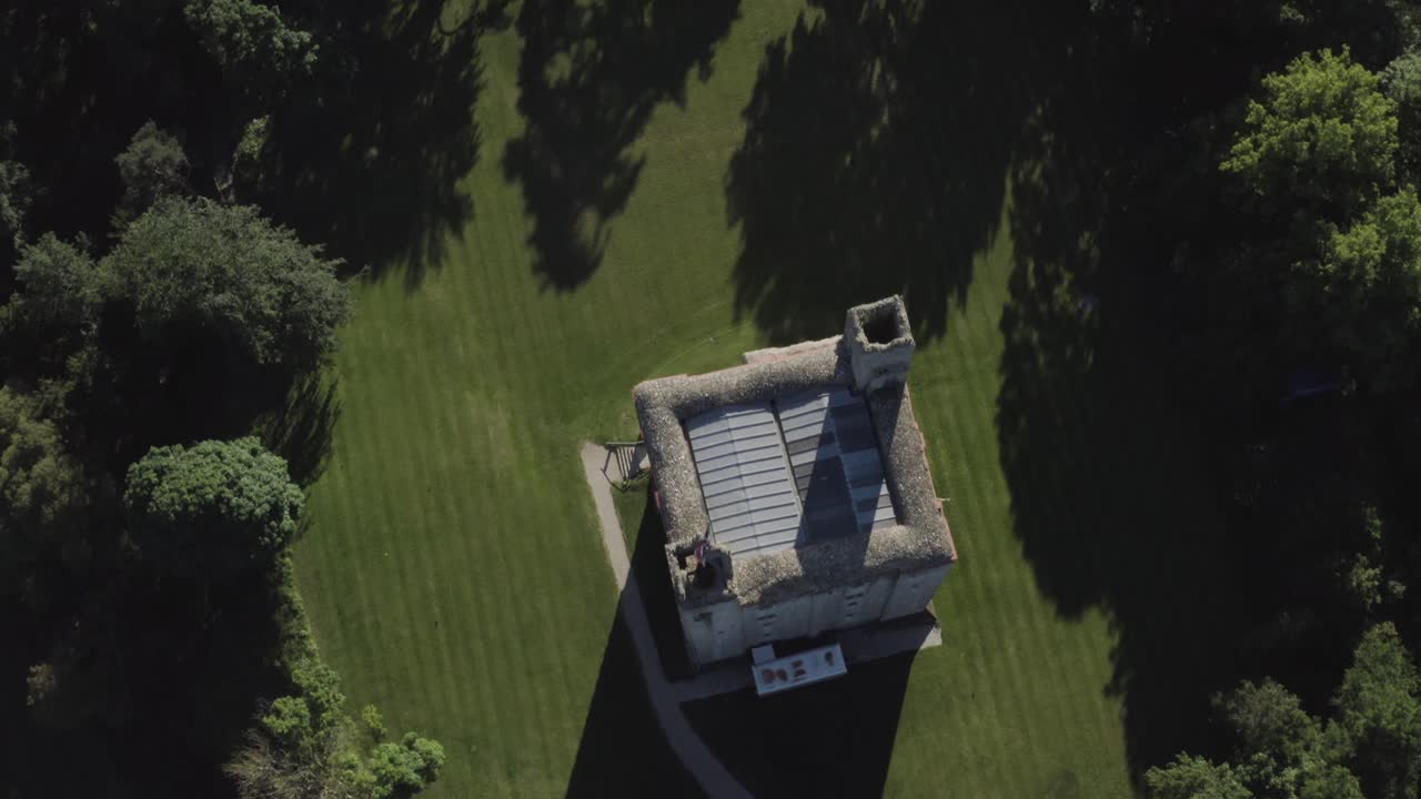 Aerial View of a Stone Castle in a Green Landscape