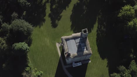 aerial view of a stone castle in a green landscape