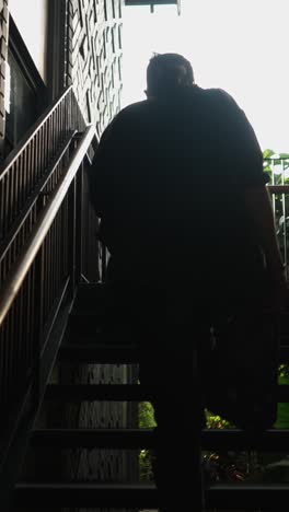 a person walking up a staircase