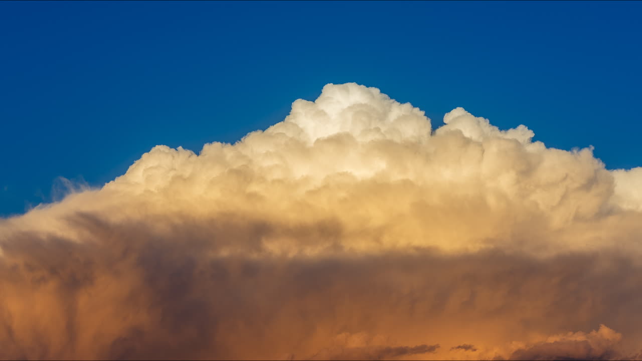 Majestic Cumulus Clouds Against a Blue Sky
