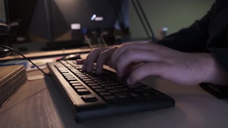 person typing on a keyboard