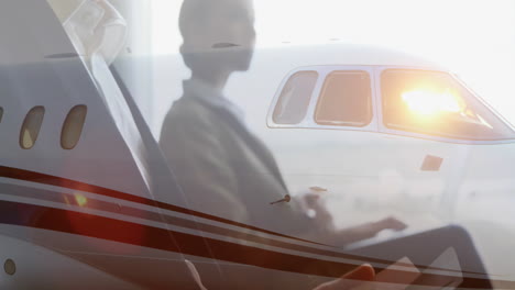 avión de negocios volando con un hombre de negocios trabajando en animación de tableta