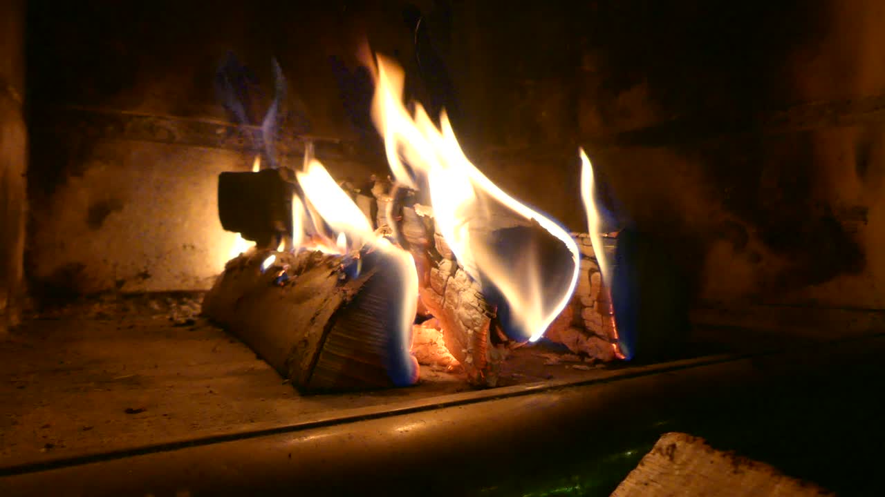Fireplace with freshly cut logs