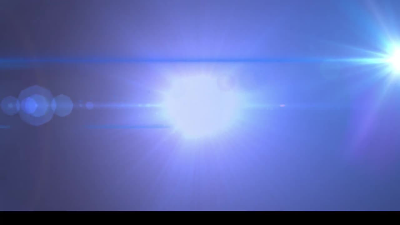 animación de partículas y líneas que se mueven con luz brillante sobre fondo azul