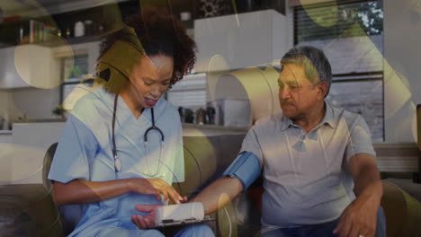 healthcare nurse applying pressure cuff on patient at home, displaying animated heart icon