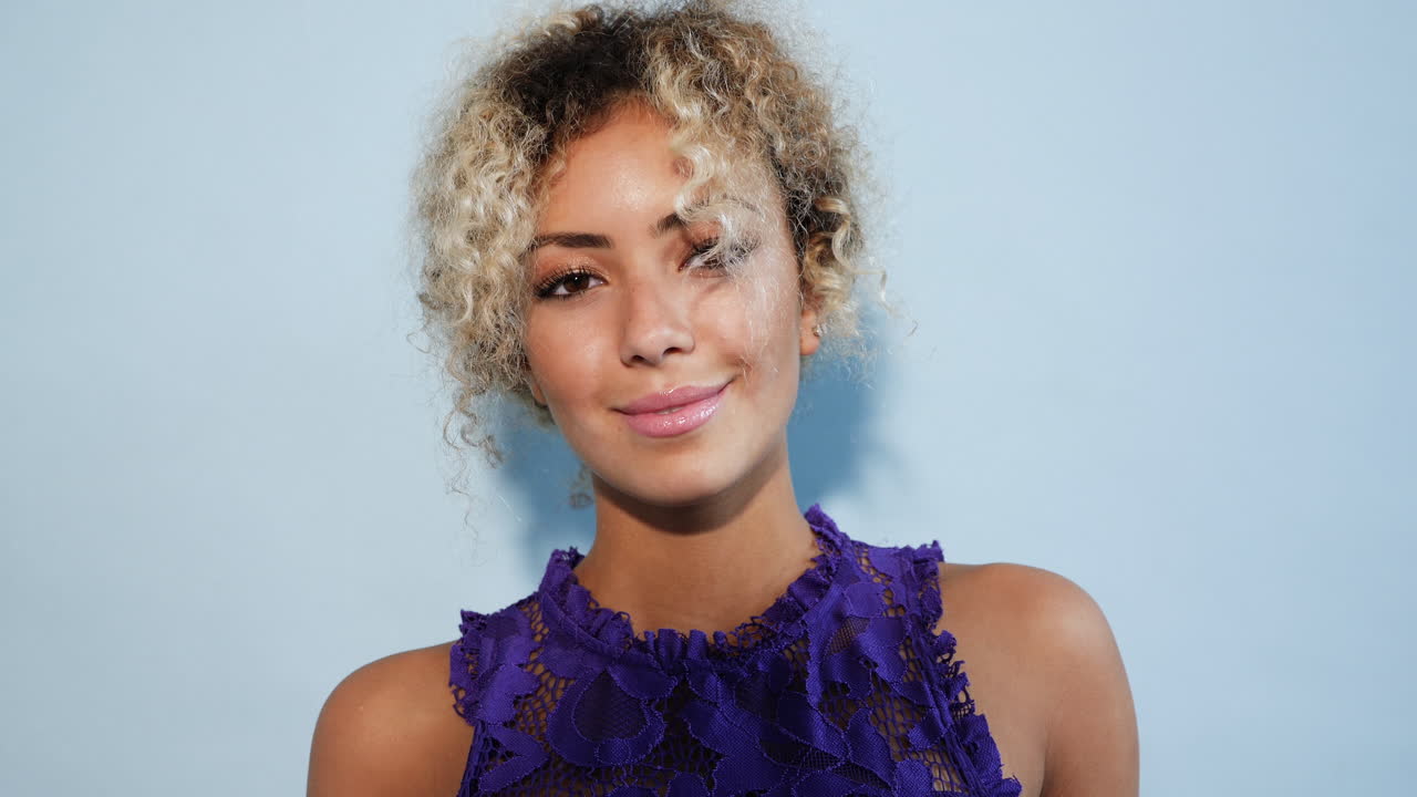 Smiling Woman in Purple Lace Dress