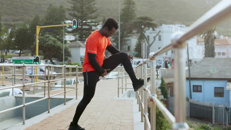 black man, stretching legs and running in city