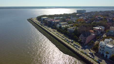 a drone shot of the seawall in charleston, sc