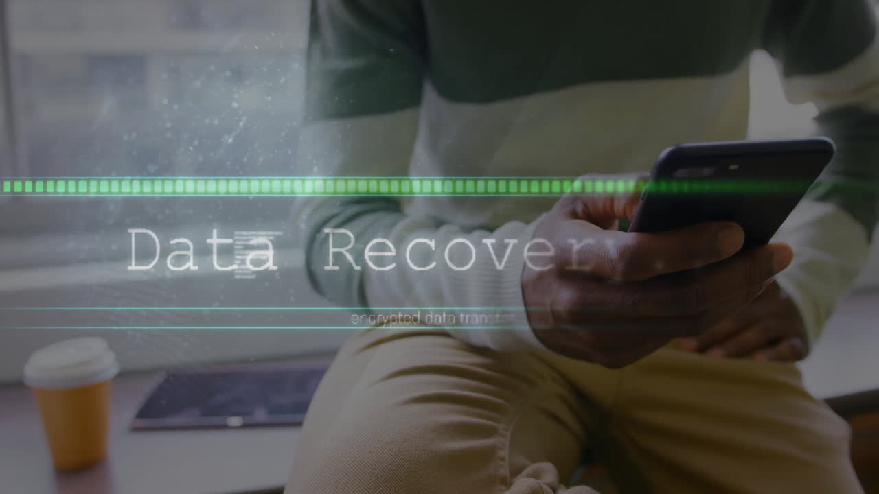 Man using smartphone by window, showing encrypted data transfer with progress bar for tech review