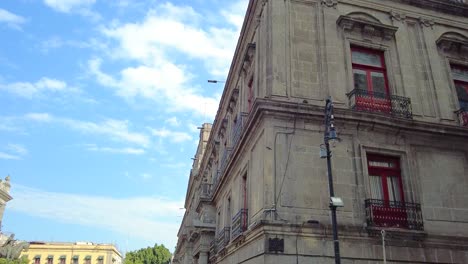 A-classic-Mexican-building,-with-its-intricate-details,-colorful-façade,-and-impressive-colonial-design