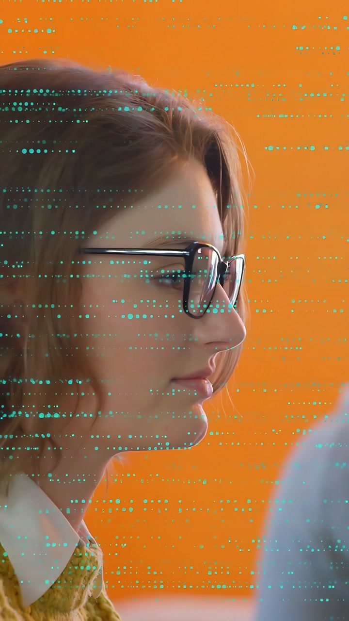 Vertical video: Woman turning, reacting to offscreen prompt in tech, teal glitch crossing glasses